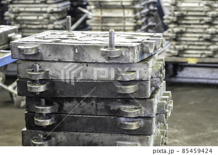 Large metal presses for the manufacture of various shapes of glass products are in stock in manufacture or factory. Large metal presses for the manufacture of various shapes of glass products are in stock in manufacture or factory. 85459424