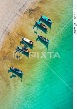 Long tail boats in Patong beach in Phuket Province, Thailand Long tail boats in Patong beach in Phuket Province, Thailand 85459696
