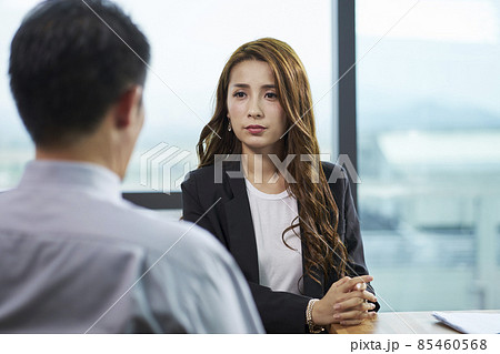 young asian business woman being interviewed by hr manager in modern corporate office young asian business woman being interviewed by hr manager in modern corporate office 85460568