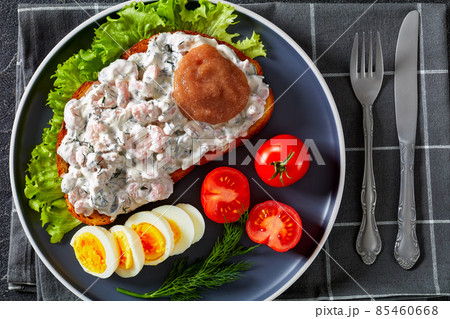 danish smorrebrod with shrimps, mayo, roe, and egg 85460668