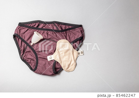 Reusable Women Menstrual Hygiene products on grey Reusable Women Menstrual Hygiene products on grey 85462247