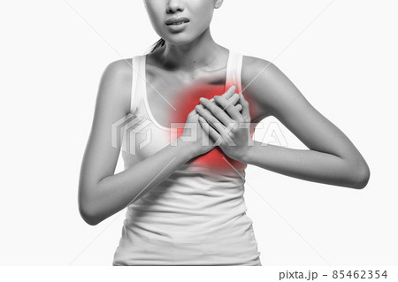 Cropped of woman suffering from heartburn or breast pain Cropped of woman suffering from heartburn or breast pain 85462354