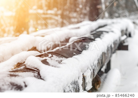 The heating main provides the city with hot water. Pipeline trunk. Selective focus 85466240