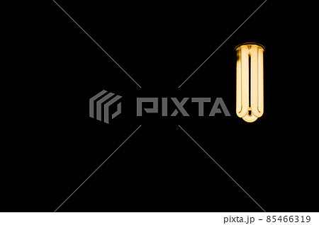 Luminous tubes of a fluorescent lamp on a black background. Selective focus, copy space Luminous tubes of a fluorescent lamp on a black background. Selective focus, copy space 85466319
