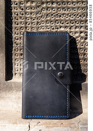 hand made leather wallet . Leather craft. Selective focus hand made leather wallet . Leather craft. Selective focus 85466938