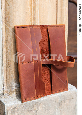 hand made leather wallet . Leather craft. Selective focus hand made leather wallet . Leather craft. Selective focus 85466984