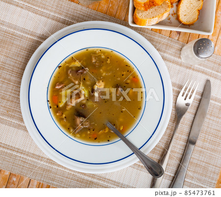 Soup with assorted mushrooms, vegetables and pork Soup with assorted mushrooms, vegetables and pork 85473761