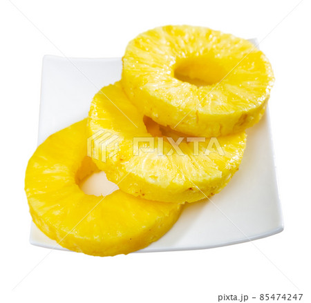 Beautifully laid out canned pineapple on a plate 85474247
