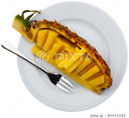 Slices of ripe pineapple 85474283