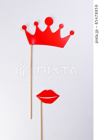 Red crown lips shape paper die cut selfie portrait party fun paper prop sticker stick on white background Red crown lips shape paper die cut selfie portrait party fun paper prop sticker stick on white background 85478959