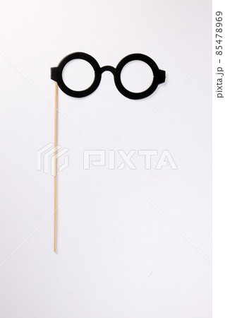 Black round eyewear spectacle frame shape paper die cut selfie portrait party fun paper prop sticker stick on white background Black round eyewear spectacle frame shape paper die cut selfie portrait party fun paper prop sticker stick on white background 85478969