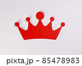Red crown shape paper die cut selfie portrait party fun paper prop sticker stick on white background  85478983