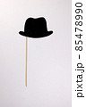Black hat shape paper die cut selfie portrait party fun paper prop sticker stick on white background  85478990