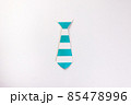 White and blue neck tie shape paper die cut selfie portrait party fun paper prop sticker stick on white background  85478996