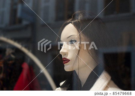 Portrait of brunette mannequin in a fashion store showroom Portrait of brunette mannequin in a fashion store showroom 85479668