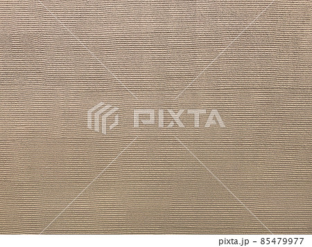 櫛引きで仕上げた生壁色の塗り壁の背景画像 85479977