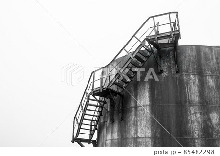 Fuel old chemical tank barrel oil in an industrial abandoned plant Fuel old chemical tank barrel oil in an industrial abandoned plant 85482298