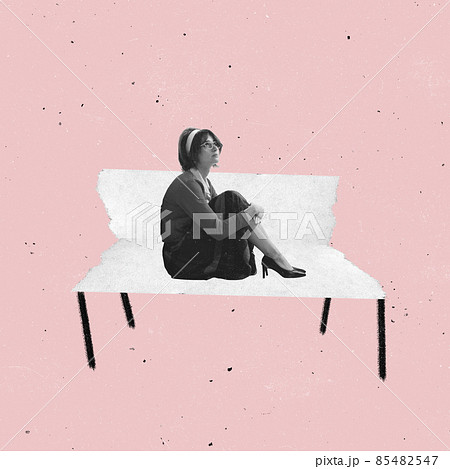 Contemporary art collage of woman in vintage suit sitting on paper bench isolated over pink background. Grunge effect Contemporary art collage of woman in vintage suit sitting on paper bench isolated over pink background. Grunge effect 85482547