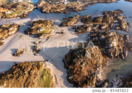 The beautiful Cloughglass bay and beach by Burtonport in County Donegal - Ireland The beautiful Cloughglass bay and beach by Burtonport in County Donegal - Ireland 85485822