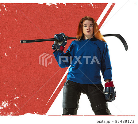 Creative design. Contemporary art collage of young woman, professional hockey player posing isolated over white and red background Creative design. Contemporary art collage of young woman, professional hockey player posing isolated over white and red background 85489173