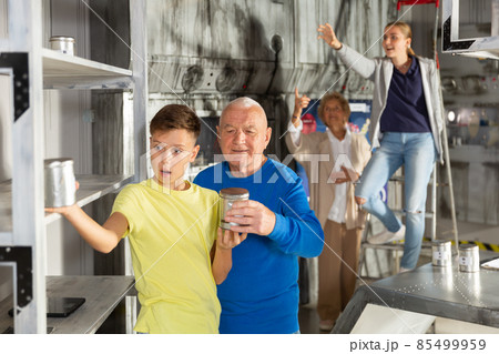 Kids and grandparents solving conundrum in quest room Kids and grandparents solving conundrum in quest room 85499959