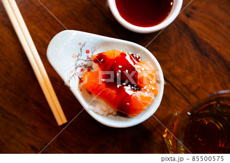 Chirashi - scattered rice with salmon Chirashi - scattered rice with salmon 85500575