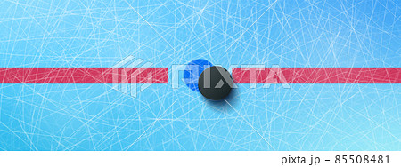 Hockey puck on blue ice rink top view background 85508481