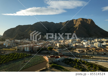 Aerial view Callosa de Segura townscape located in foothills. Spain 85514524