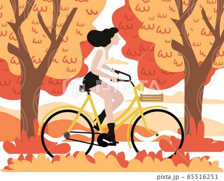 Autumn woman riding a bicycle with tree background Autumn woman riding a bicycle with tree background 85516251