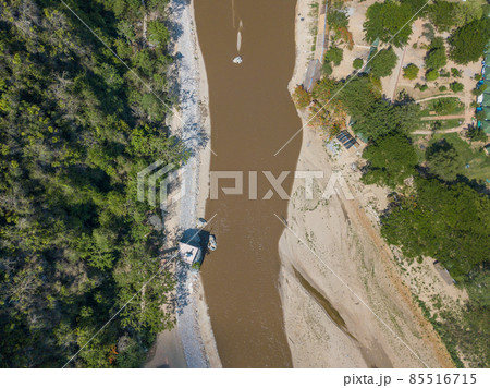 Aerial view of dry river of Kok river in hot season nearly Chiang Rai beach, a river bank with rocky shores view. 85516715
