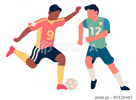 Soccer player kicking ball in front of another team member. Shot attempt 85520487