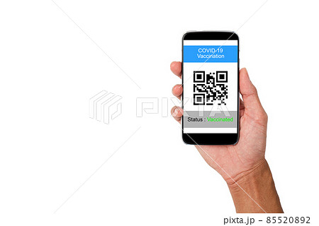 Hand holding a mobile phone showing the status of vaccination against COVID-19 Hand holding a mobile phone showing the status of vaccination against COVID-19 85520892