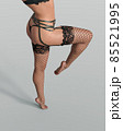 Bum and legs of sexy woman in black garter belt, stockings standing on white background 85521995