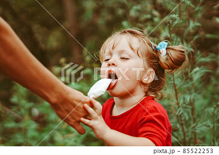 little girl with ice cream little girl with ice cream 85522253