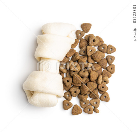 Delicacy for dogs. Chewing bone and dried food for dog Delicacy for dogs. Chewing bone and dried food for dog 85522301