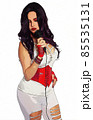 1980s Style Singer With Microphone Wearing White and Red Clothing 85535131