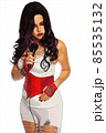 1980s Style Singer With Microphone Wearing White and Red Clothing 85535132