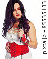 1980s Style Singer With Microphone Wearing White and Red Clothing 85535133