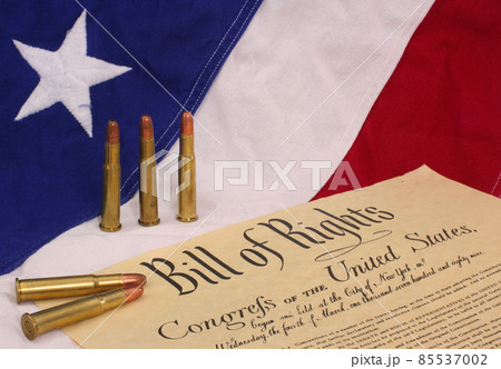Bill of Rights With Bullets and American Flag Background Bill of Rights With Bullets and American Flag Background 85537002