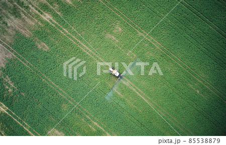 Fertilizing farming field theme 85538879
