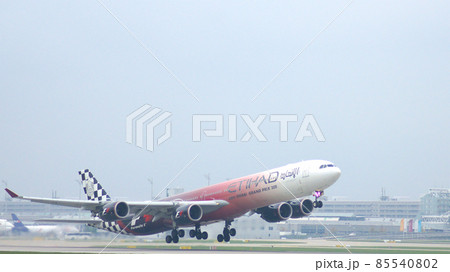 MUNICH, GERMANY - 11 OCTOBER 2015: Etihad Airways Airbus A340 take off at airport 85540802