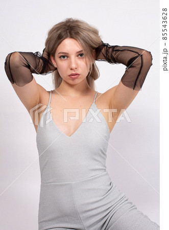Young white european woman on grey Young white european woman on grey 85543628