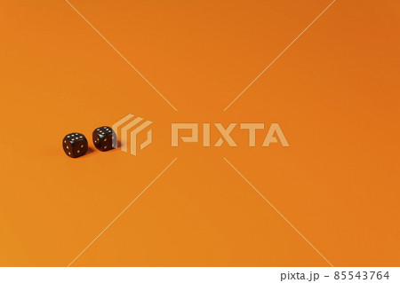 Lucky chance on game dice two sixes on orange background Lucky chance on game dice two sixes on orange background 85543764