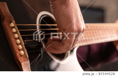 man playing guitar man playing guitar 85544526