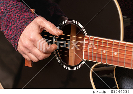 man playing guitar man playing guitar 85544552