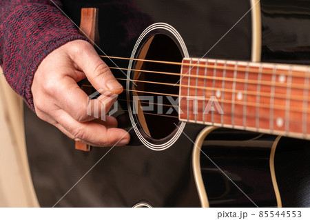 man playing guitar man playing guitar 85544553