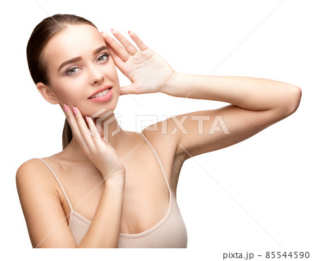 Beautiful Young Woman with Clean Fresh Skin isolated on white background Beautiful Young Woman with Clean Fresh Skin isolated on white background 85544590