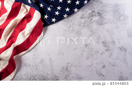 Happy presidents day concept with flag of the United States on stone background. Happy presidents day concept with flag of the United States on stone background. 85544803