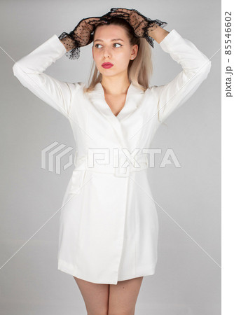 Young white european woman on grey 85546602