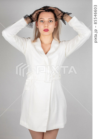 Young white european woman on grey 85546603